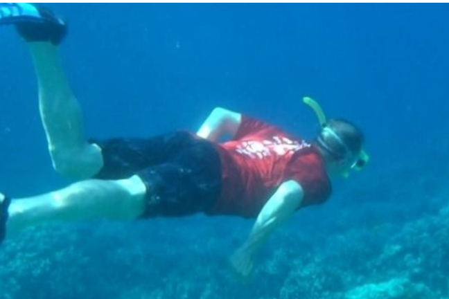 a person swimming in the water